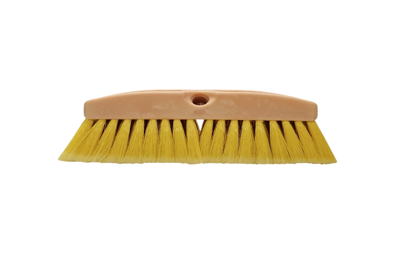 Yellow brush with a pink handle on a white background