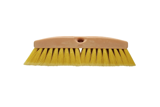 Yellow brush with a pink handle on a white background